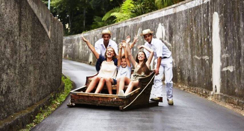 Things to do in Madeira Island with Kids - toboggan sledges